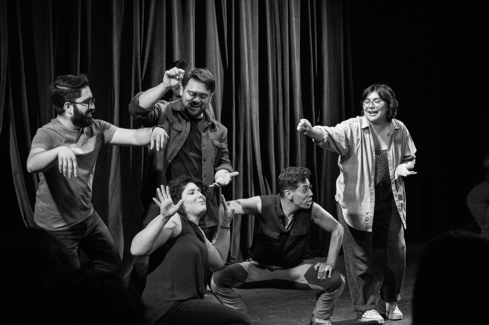 Students performing in a Bilingual Improv School class